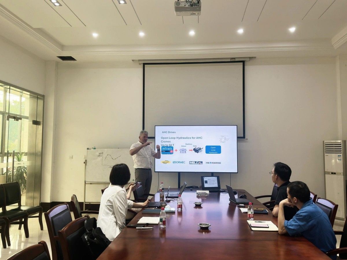 OUCO engineering team discussing wave compensation