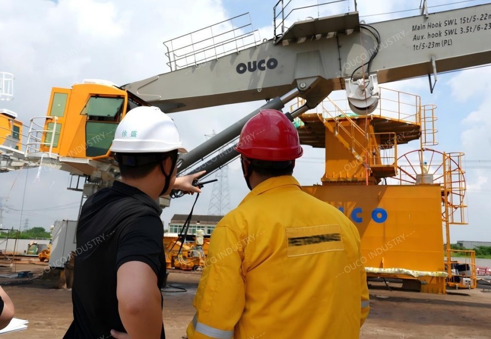 OUCO and Client engineers inspecting OUCO crane components