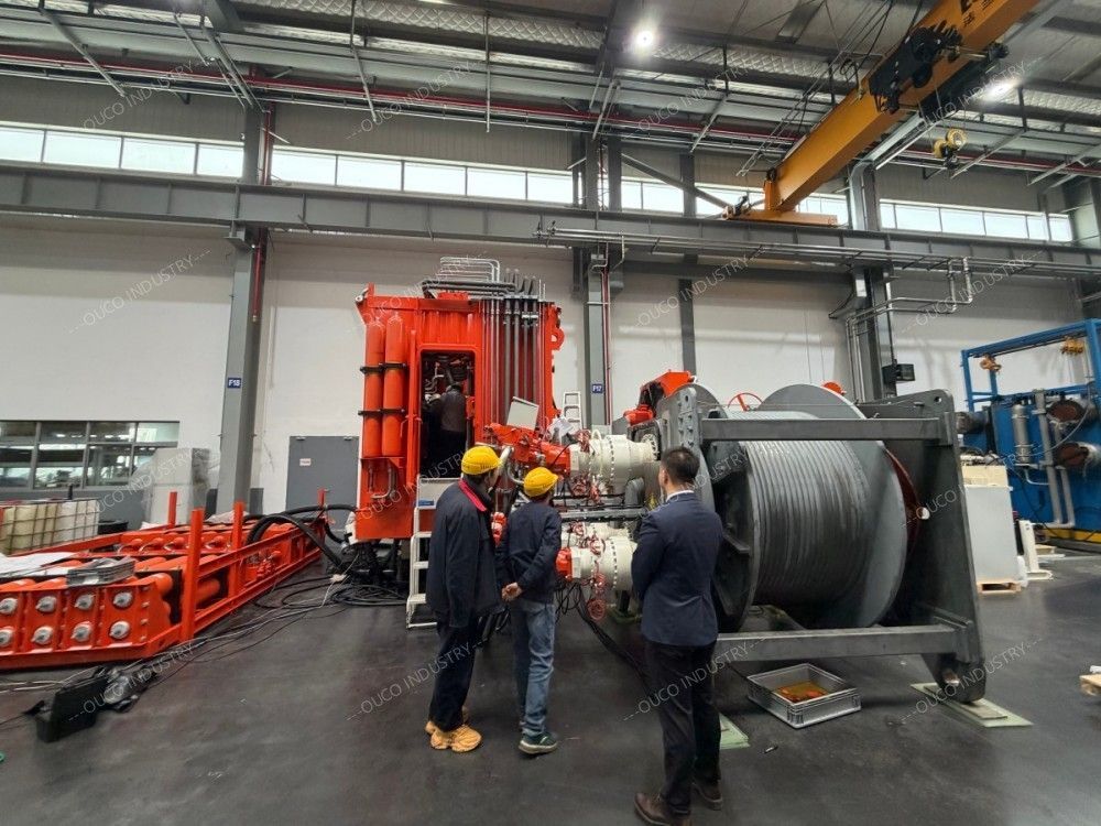 Team inspecting a Crane AHC Winch