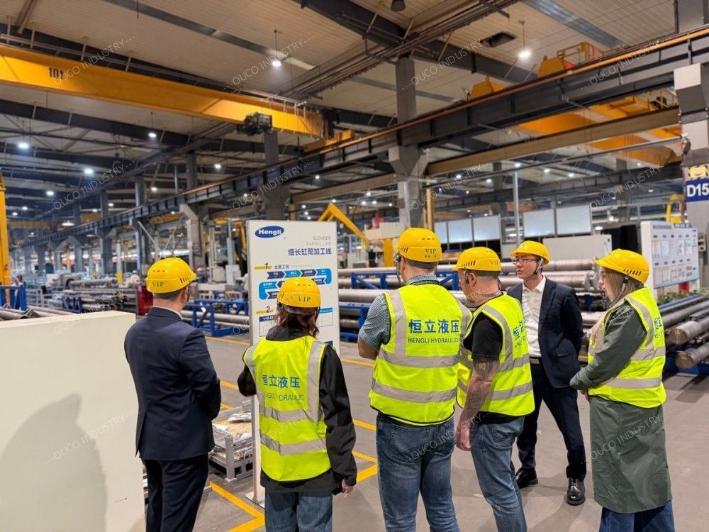 Guided group tour through a heavy machinery manufacturing plant