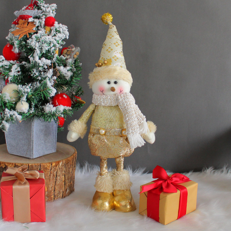 Golden Christmas retractable doll