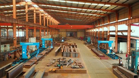 Comment un robot de soudage contrôle-t-il la vitesse d'alimentation en fil ?