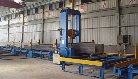 Machine d'assemblage de poutres en H à usage intensif